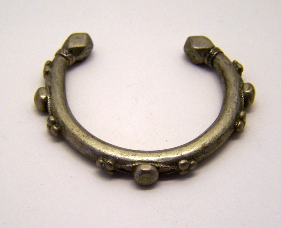 antique 800 silver african cuff bracelet: bracelet will fit a 6" to 7" wrist by 1/4" wide, weights 46.8 grams, in good condition, tested as at least 800 silver.