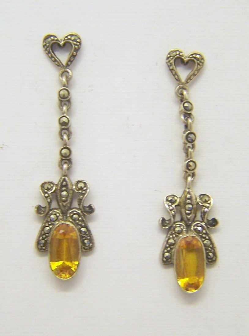sterling silver citrine marcasite drop earrings: measures 1 7/8" long by 7/16" wid, crafted with 11x6mm citrine & marcasite, weights 5.2 grams, in good condition