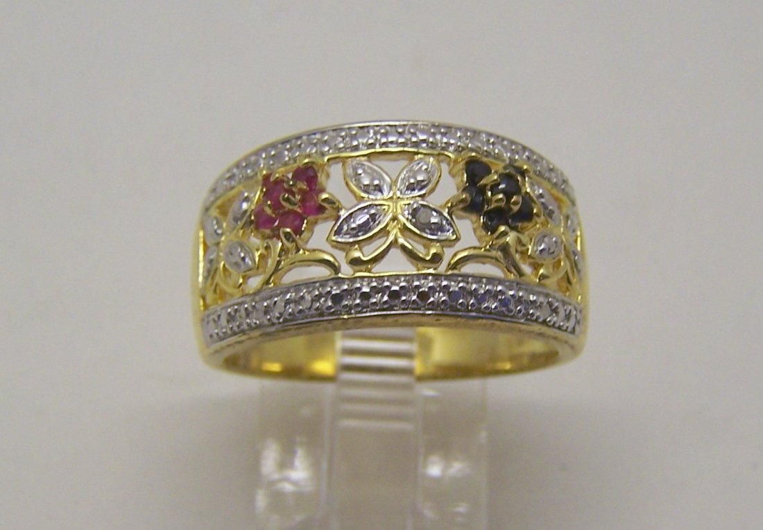Ross Simons sterling ruby sapphires diamond ring: top of the ring measures 1/2" wide, crafted with diamonds chip & 1mm rubies & sapphires, size 9, weights 5.9 grams, in great condition