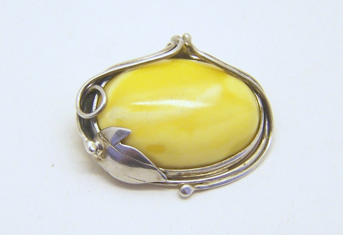 sterling silver egg yolk baltic amber brooch pin pendan: measures 1 7/16" long by 1 1/4" wide, crafted with 30x20mm amber, weights 10 grams, in good condition