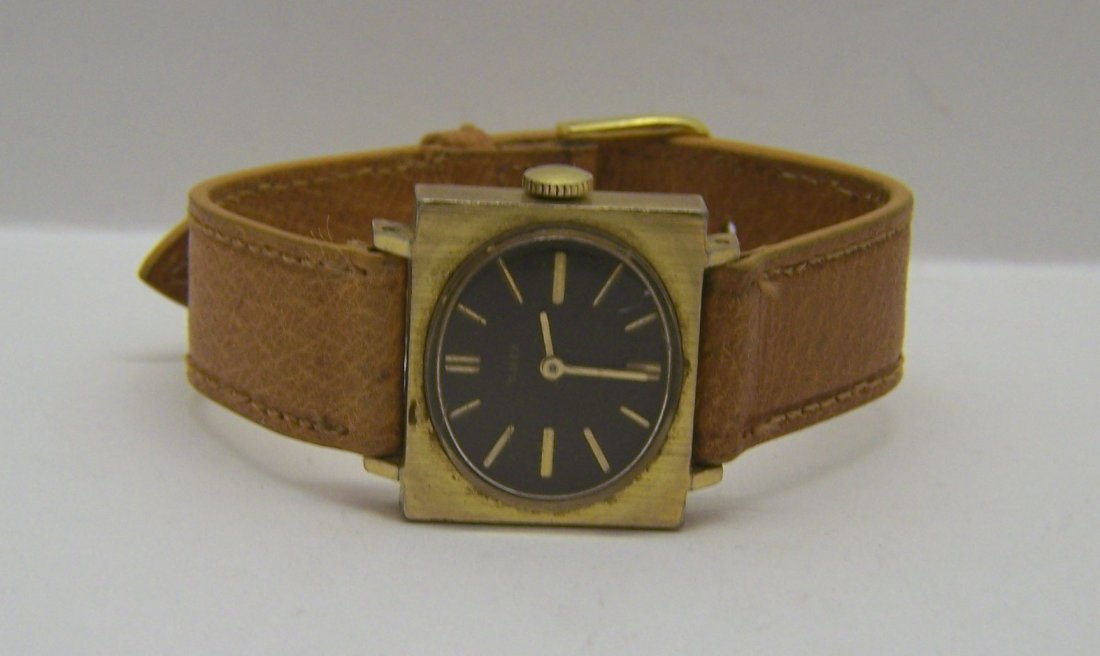 vintage TIMEX manual unisex watch: watch case measures 1 1/16" long from lug to lug by 1" wide, in good working condition