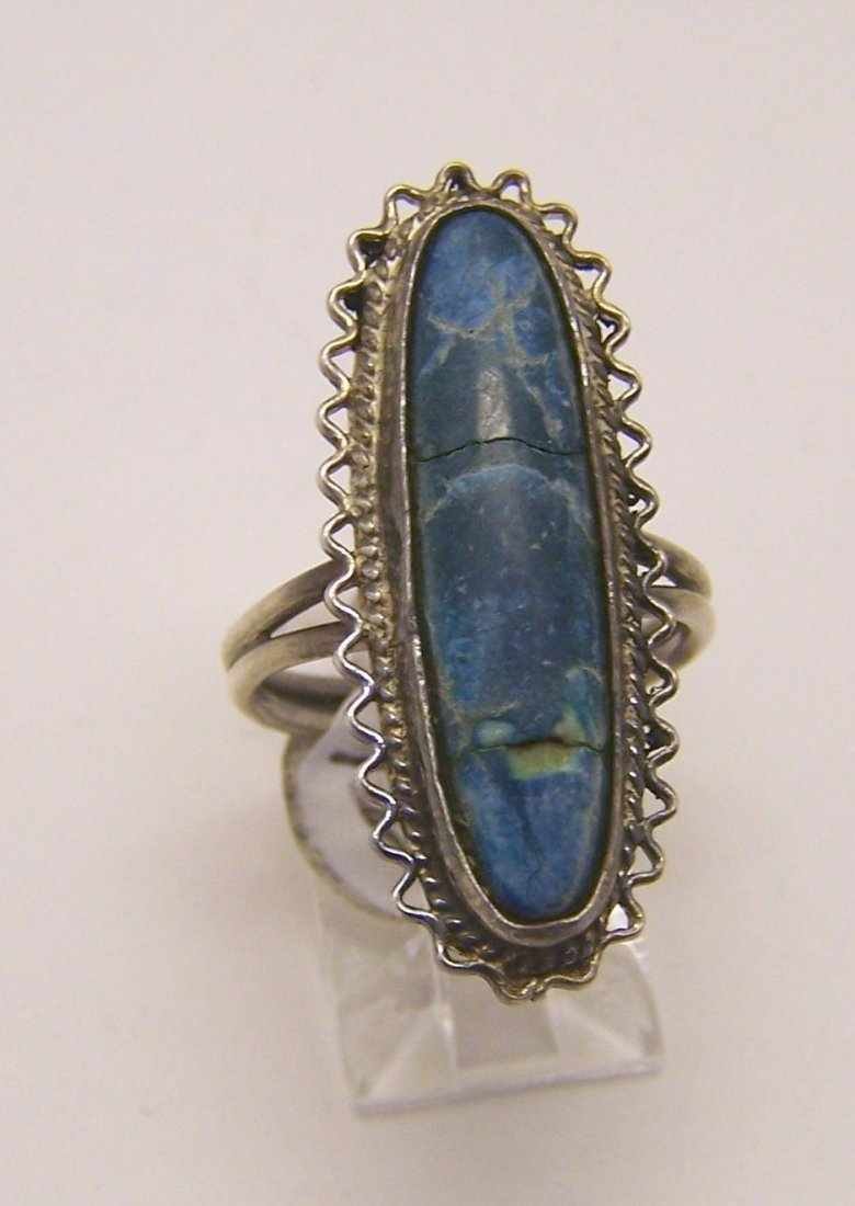 sterling silver howlite turquoise ring: top of the ring measures 1 3/8" wide, crafted with 28x6mm( stone is crack) sold as-is, size 7 3/4 , weights 6.5 grams,