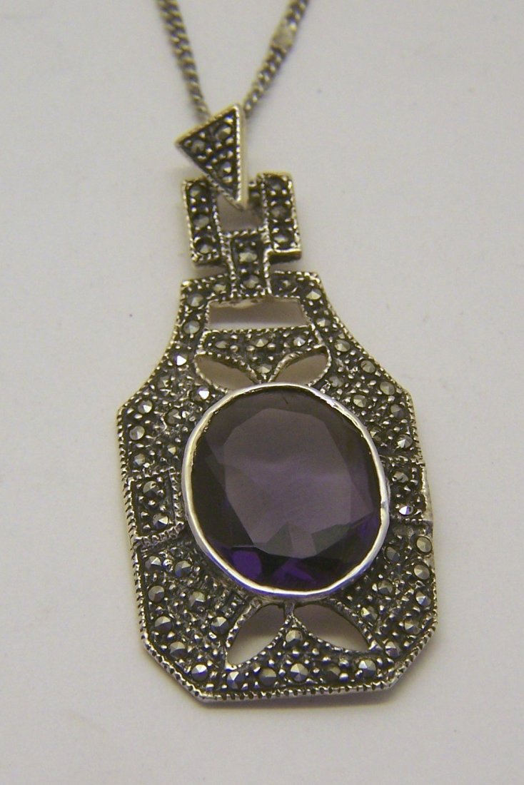 vintage sterling silver amethys marcasite pendant: measures 19 3/4" long, pendant measures 1 7/8" long, crafted with 16x14mm amethyst & marcasites, weights 11 grams, in great condition