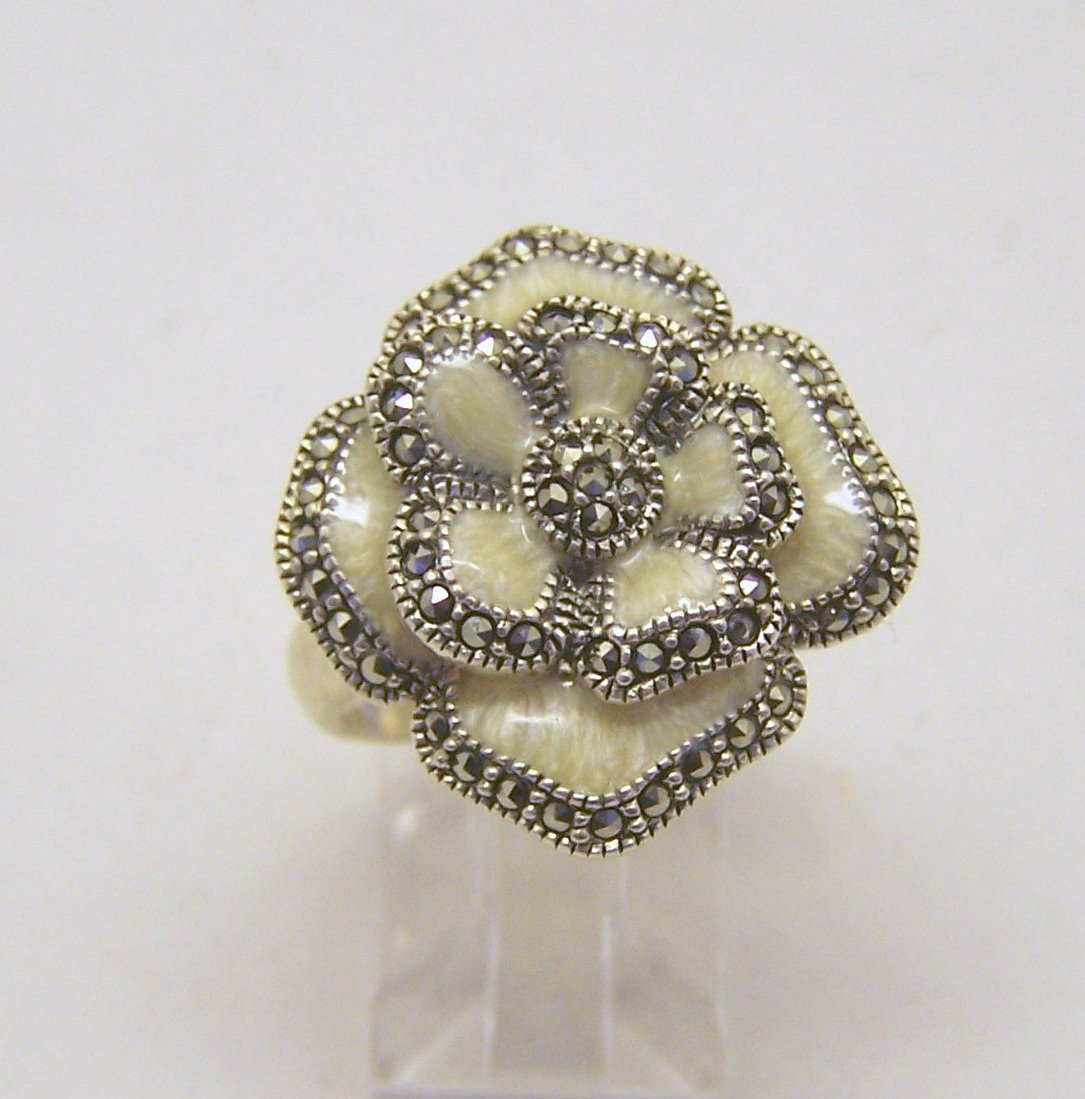 JUDITH JACK sterling marcasite ring: top of the ring measures 15/16" wide, size 8, weights 9.67 grams, in good condition