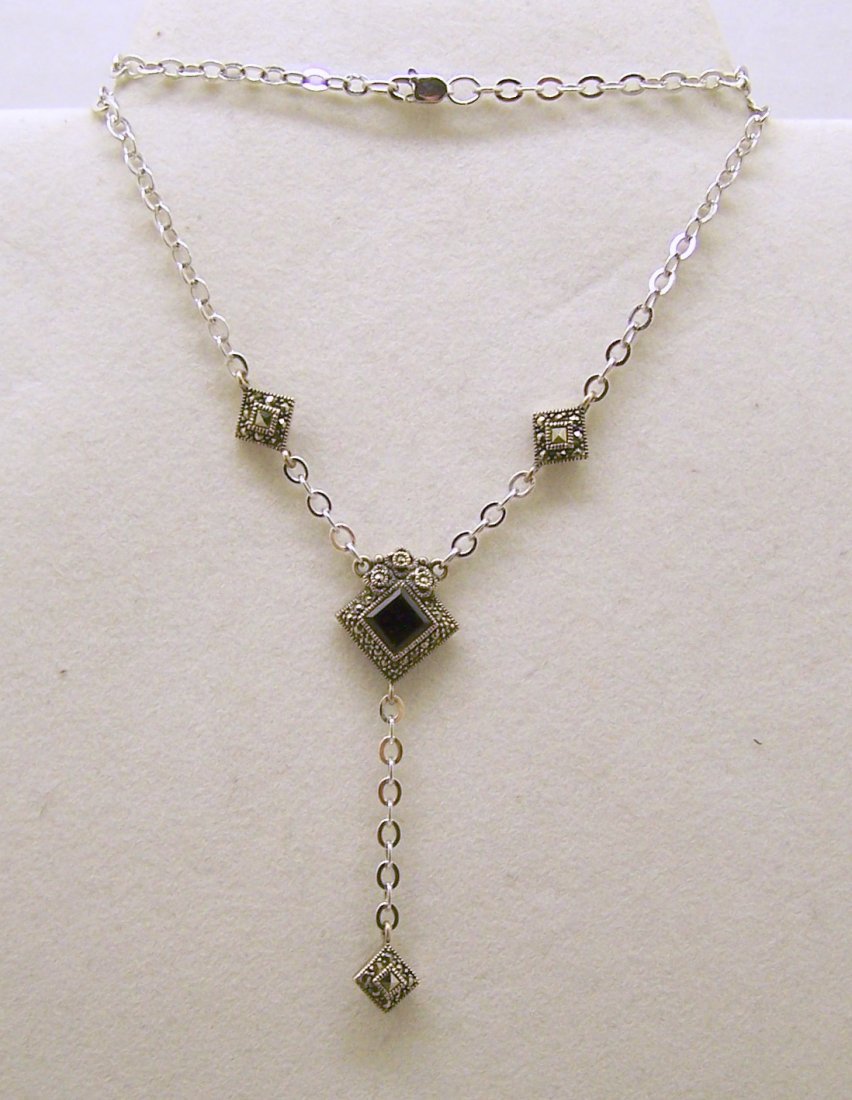 Judith Jack sterling silver onyx marcasite necklace: measures 16" long, crafted with 6x6mm onyx & marcasite, weights 9.1 grams, in good condition