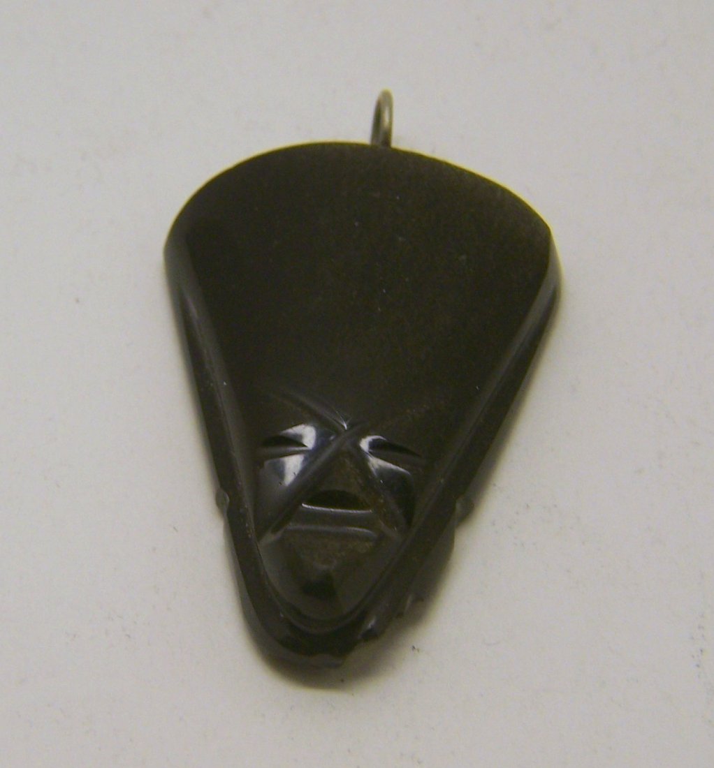 sterling silver Mexican obsidian pendant: measures 1 15/16" long by 1 3/16" wide, weights 15.8 grams, in good condition