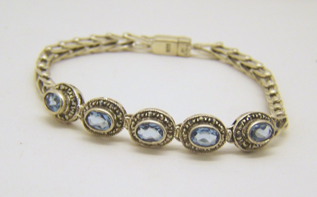M sterling silver topaz marcasite bracelet: measures 7 1/8" long by 3/8" wide, weights 12.3 grams, in good condition