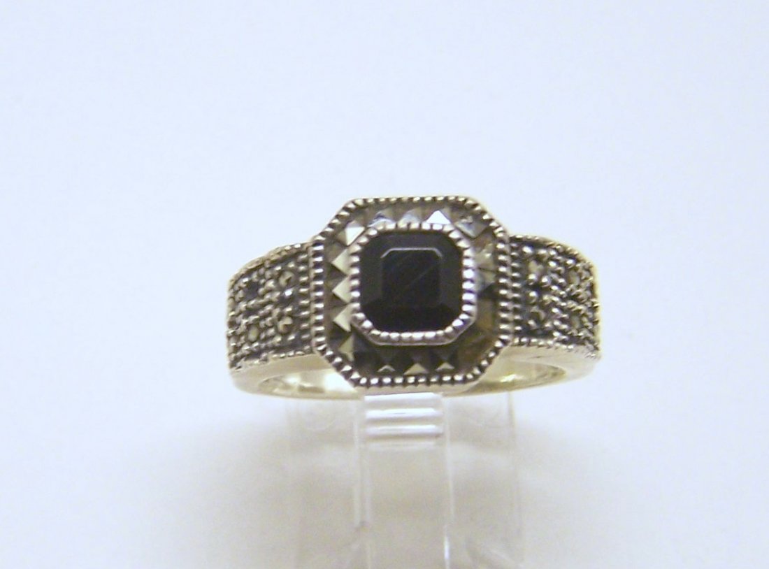 JUDITH JACK sterling silver onyx marcasite ring: top of the ring measures 7/16" wide, size 7, weights 5.7 grams, in good condition