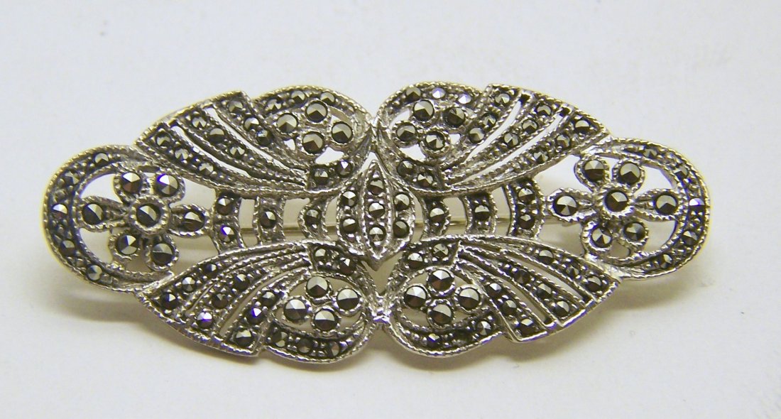 sterling silver marcasite brooch pin: measures 2" long by 7/8" wide, weights 8.3 grams, in good condition