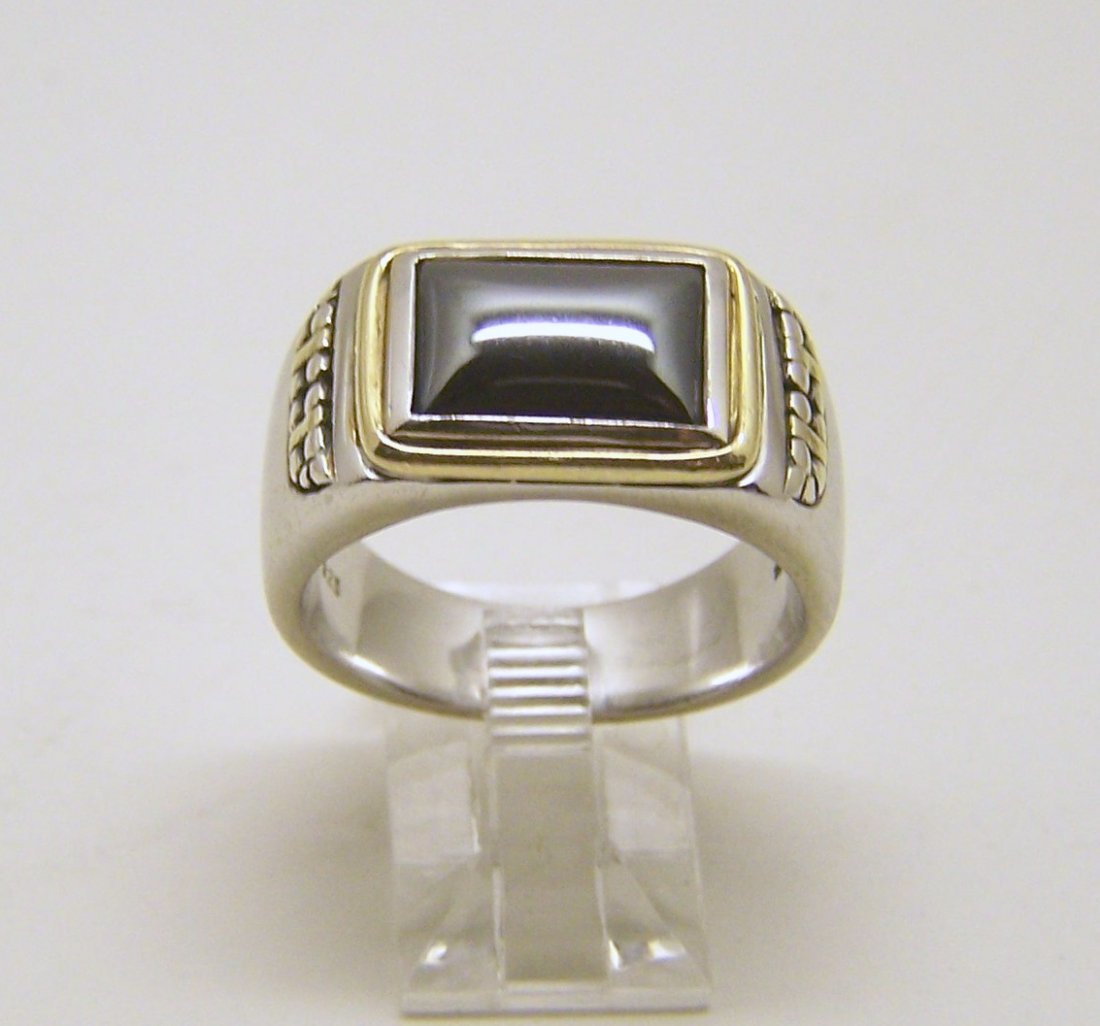 The Danbury Mint Sterling silver 14k hematite ring: top of the ring measures 1/2" wide, size 11, weights 13.2 grams, in good condition