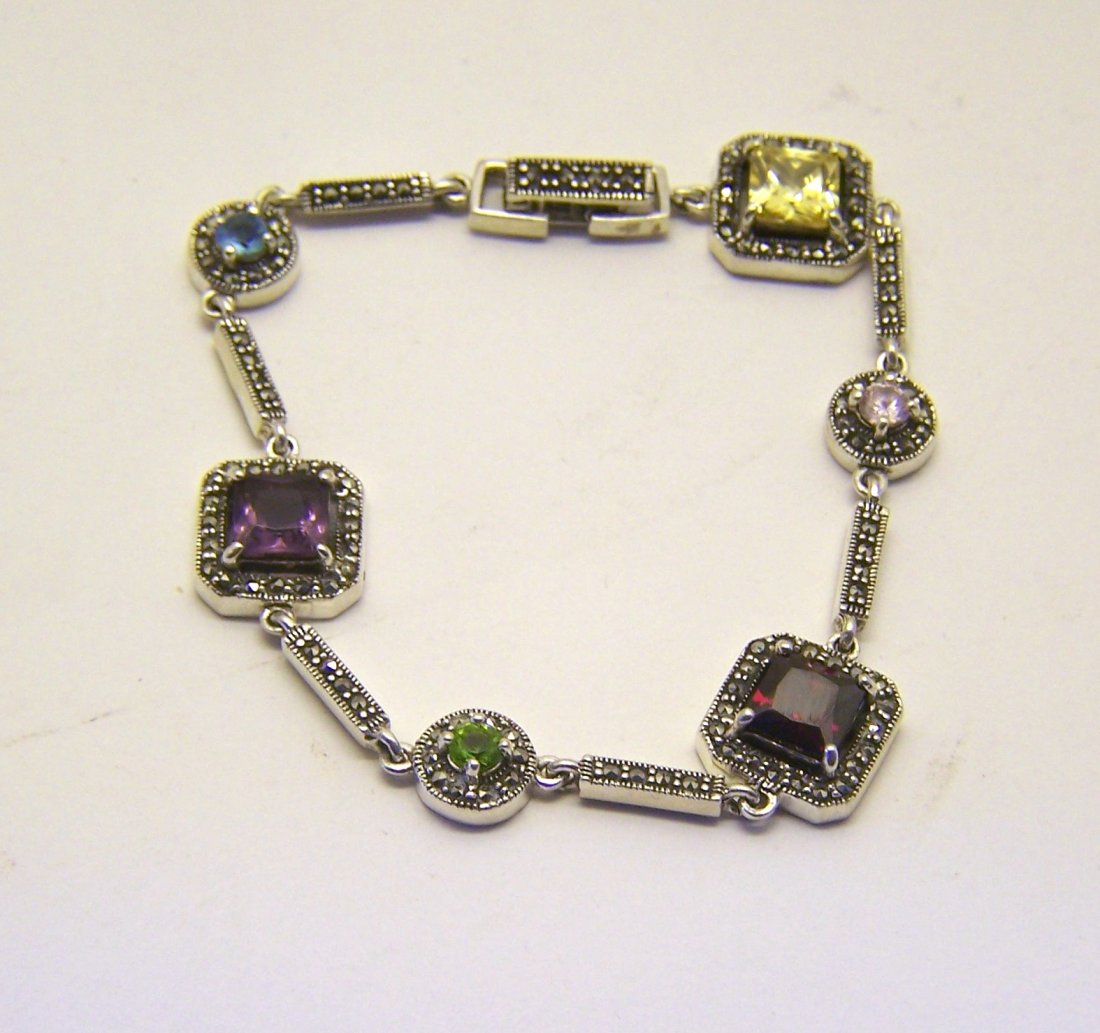 sterling silver gemstone marcasite bracelet: measures 7 1/4" long by 1/2" wide, weights 15.2 grams, in good condition