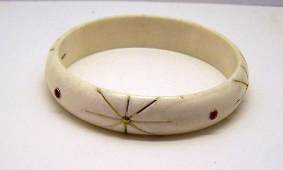 14k carved ivory ruby bangle bracelet: measures 7 1/2" in circunference by 9/16" wide, crafted with 3mm (1 missing) & 14k old wire & studs ( some of the wire is missing as well), weights 18 grams, signed 14k 585, in good condition