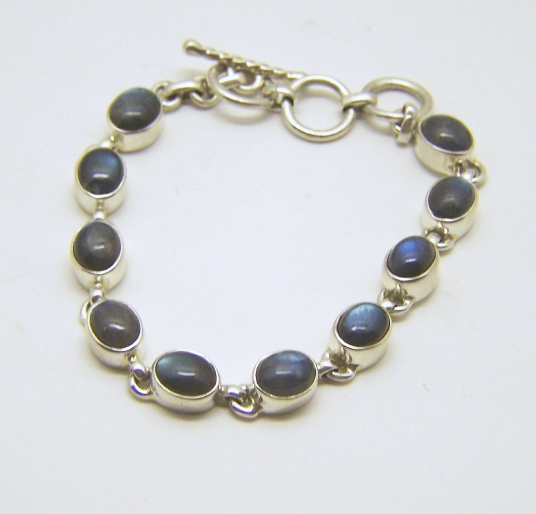 sterling silver labradorite bracelet: measures 7 3/4" long by 5/16" wide, weights 17.5 grams, in good condition