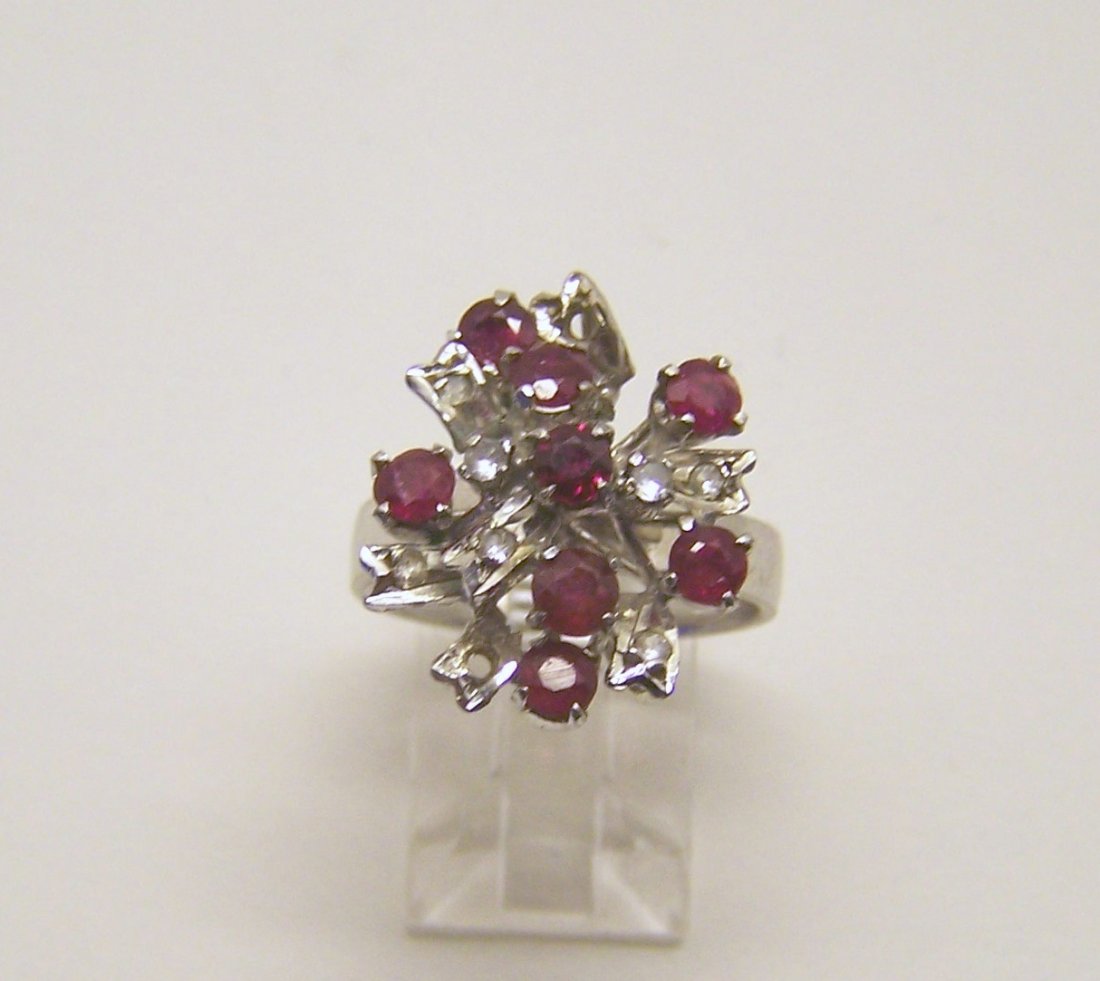 sterling silver genuine ruby topaz ring: top of the rings measures 13/16" wide,crafted with 4mm rubies, size 7, weights 5 grams, in good condition just have 2 small topaz missing but not noticeable