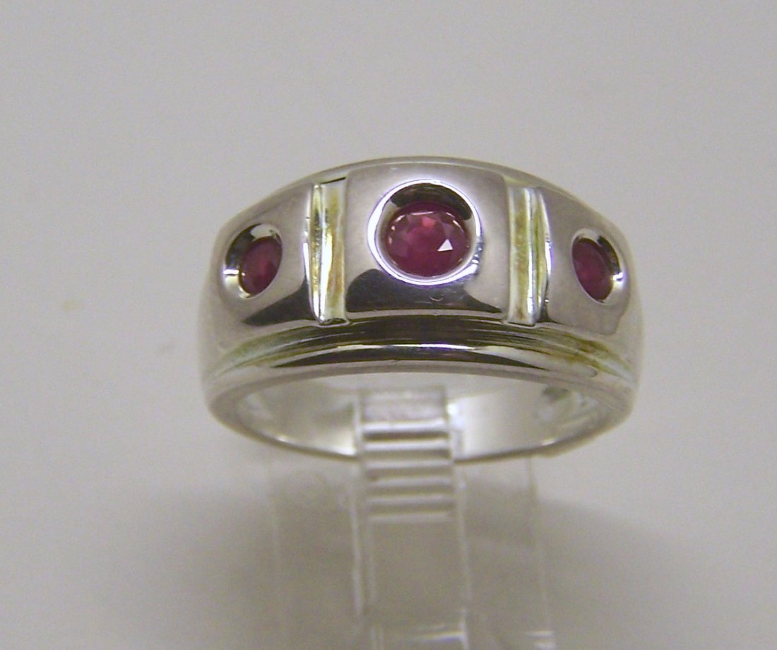 vintage ELLE sterling silver ruby ring: top of the rings measures 7/16" wide, size 8, weights 6.8 grams, in good condition