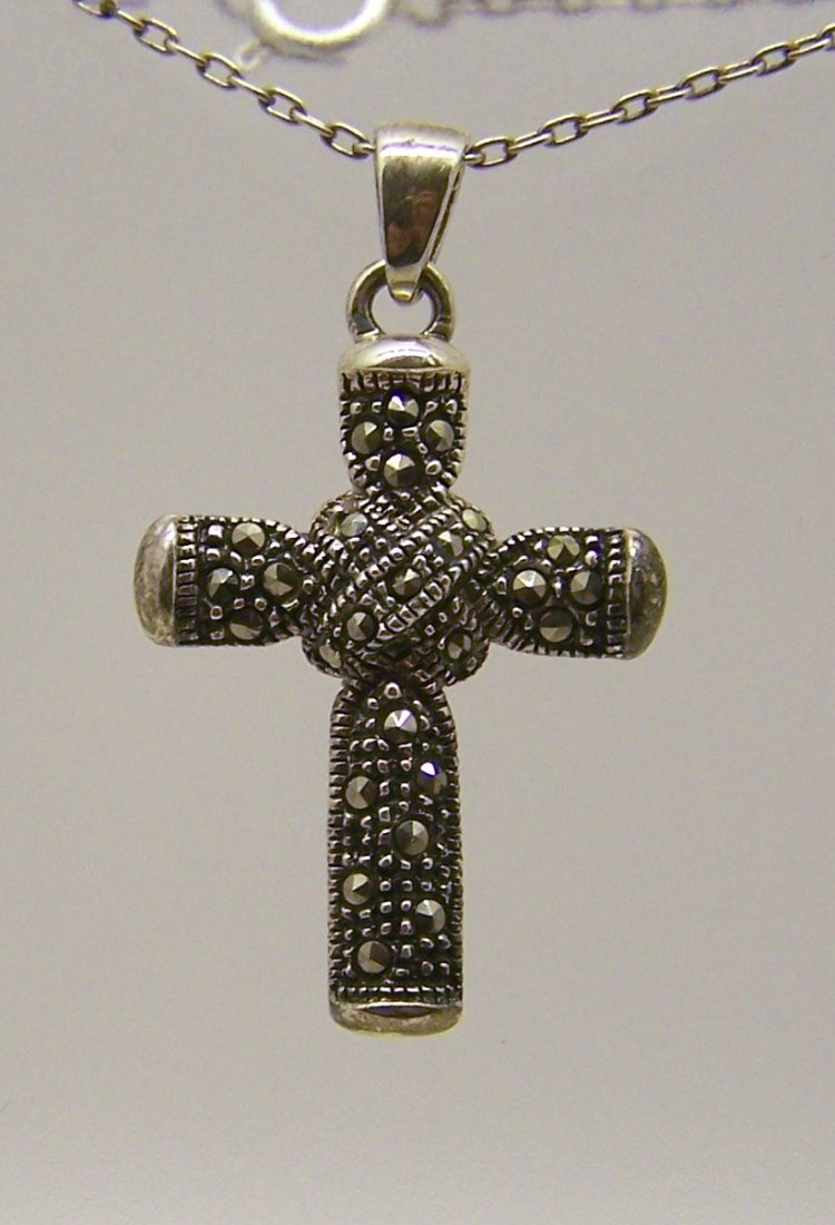 sterling silver marcasite cross pendant: measures 1 11/16" long by 15/16" wide, weights 5 grams, in good condition