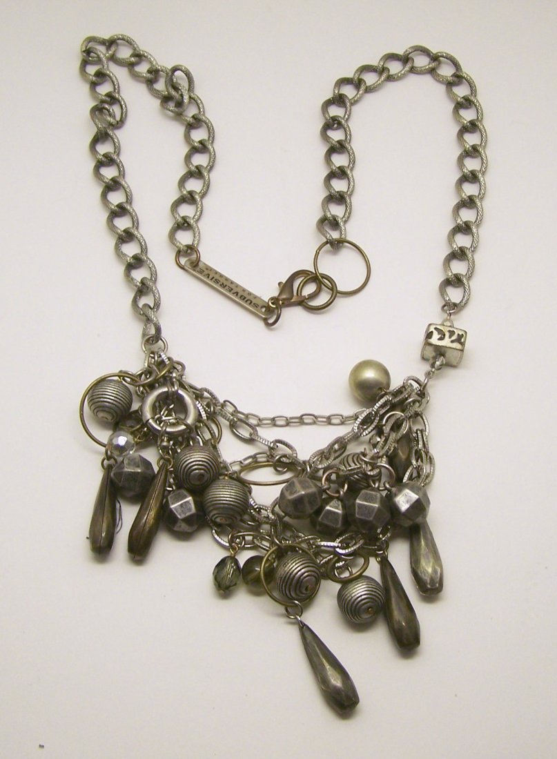 silver tone necklace: measures 30" long, in good condition