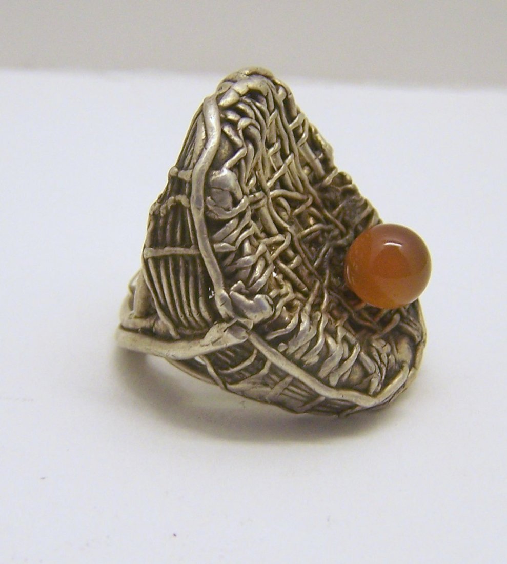 vintage studio sterling silver carnelian ring: top of the ring measures 1 3/8" wide by 1 3/16" long, size 7 1/4, weights 21.1 grams, in great condition