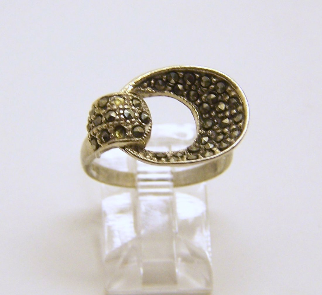 sterling silver marcasite ring: top of the ring measures 1/2" wide, size 6 1/2, weights 3.6 grams, in good condition