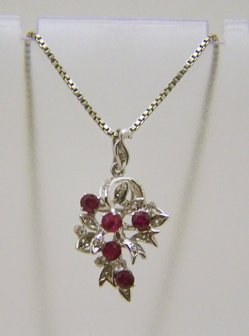 sterling silver genuine ruby topaz pendant necklace: chain measures 15 1/2" long, pendant measures 1 5/16" long, weights 6.8 grams, in good condition
