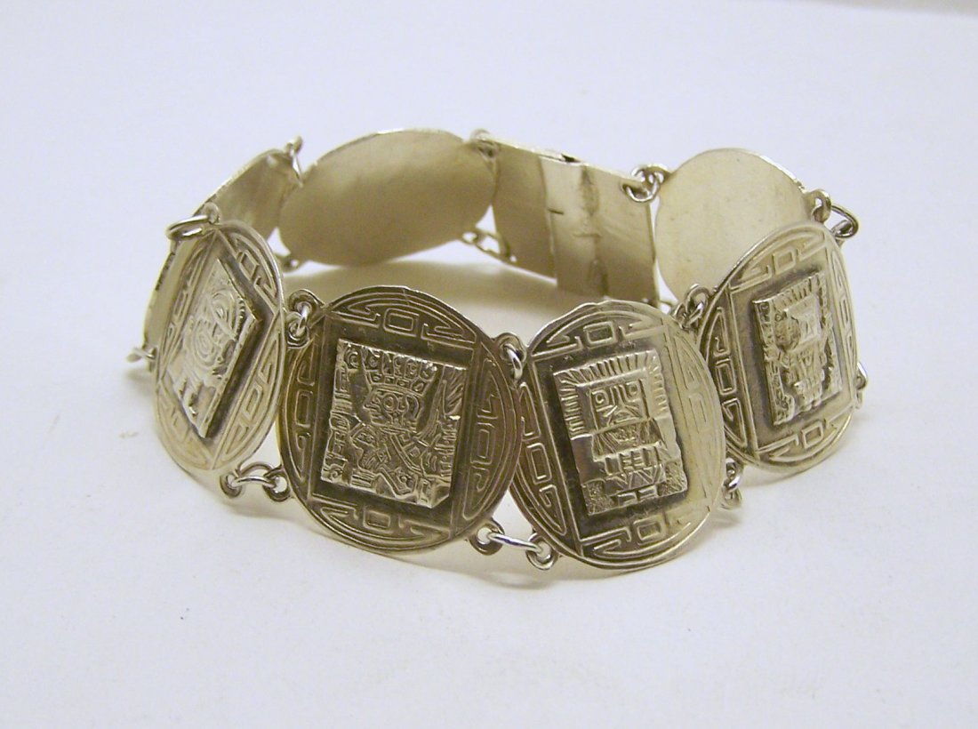 sterling silver peru incas bracelet: measures 7 3/8" long by 7/8" wide, weights 25 grams, in good condition
