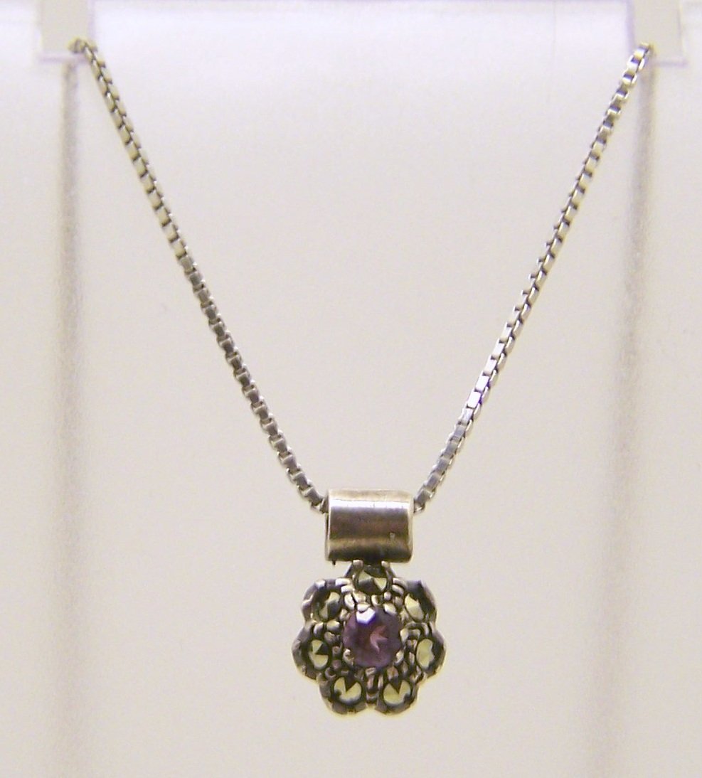 sterling silver amethyst marcasite necklace: chain measures 15 7/8" long, pendant measures 9/16" long, weights 3.4 grams, in good condition