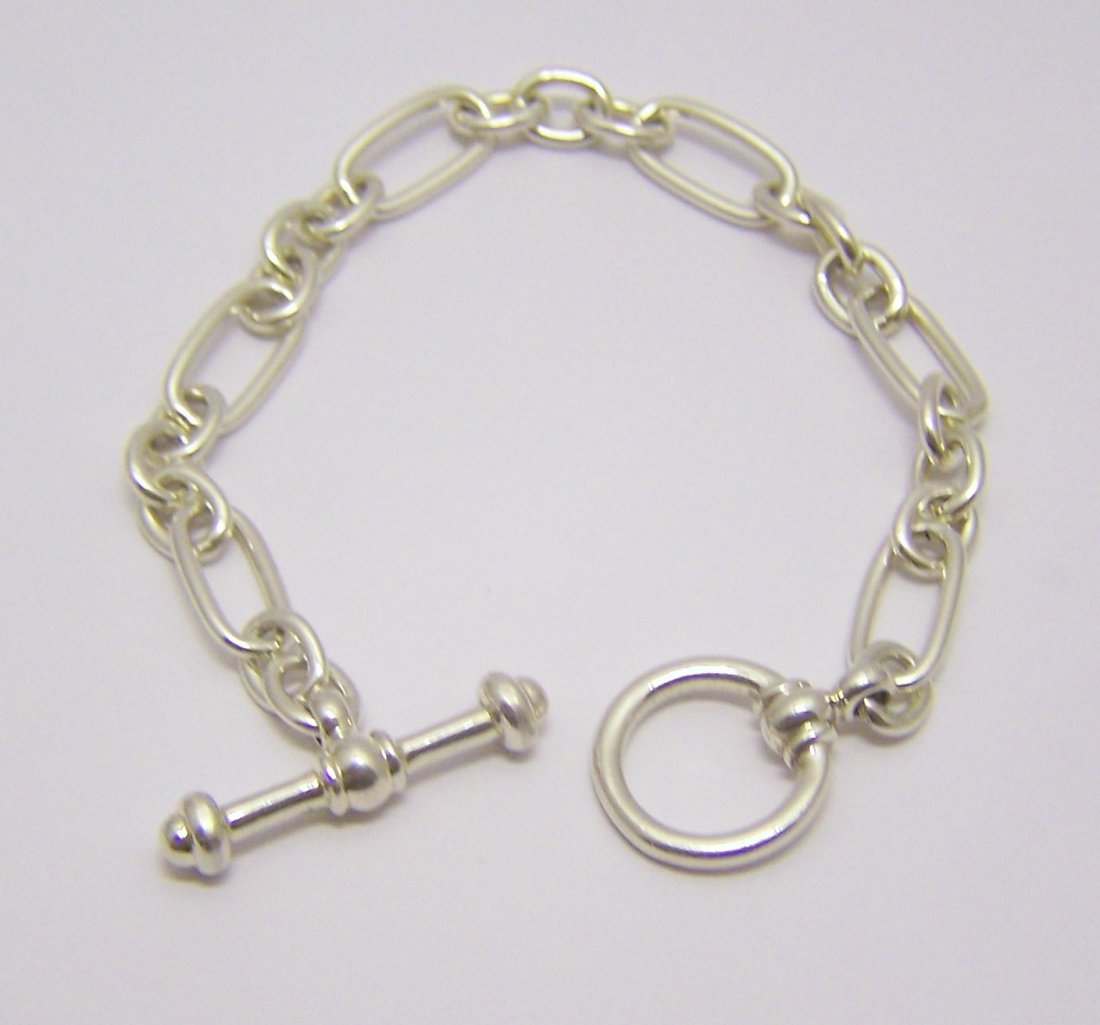 Paloma Picasso Tiffany & co sterling silver bracelet: measures 7 5/8" long by 5/16" wide, weights 18.6 grams, in good condition