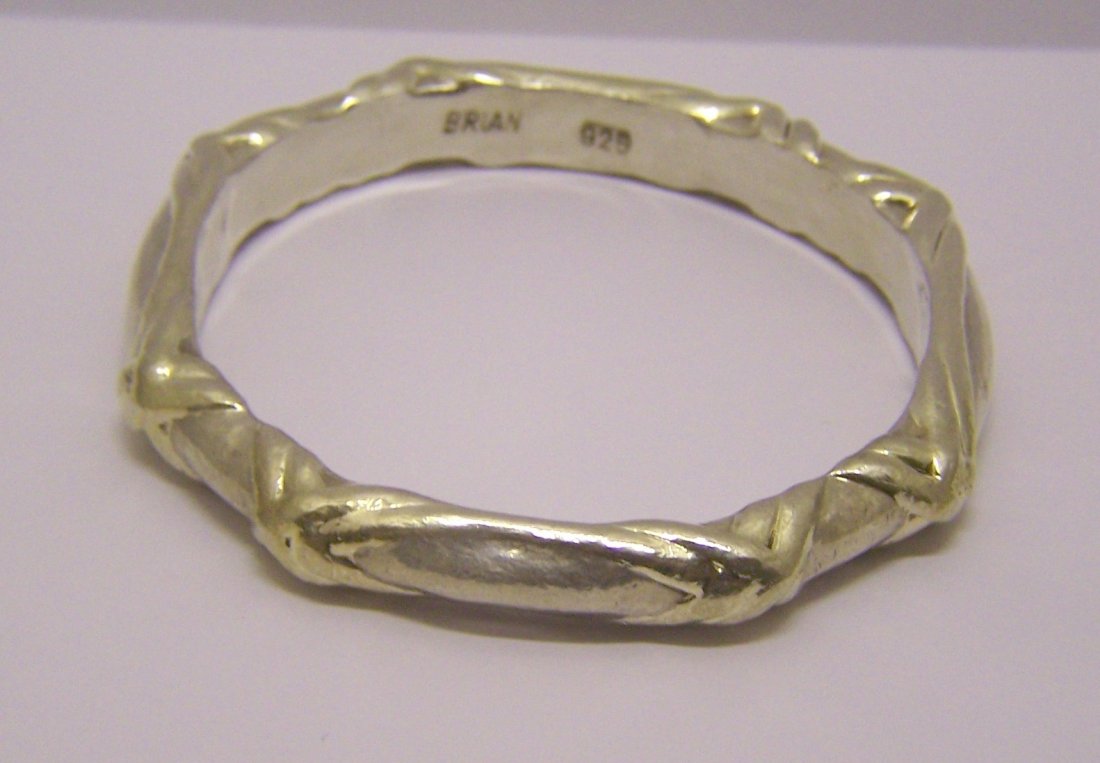 BRIAN sterling silver bangle bracelet: measures 8" in circunference by 3/8" wide, weights 21.5 grams, in good condition