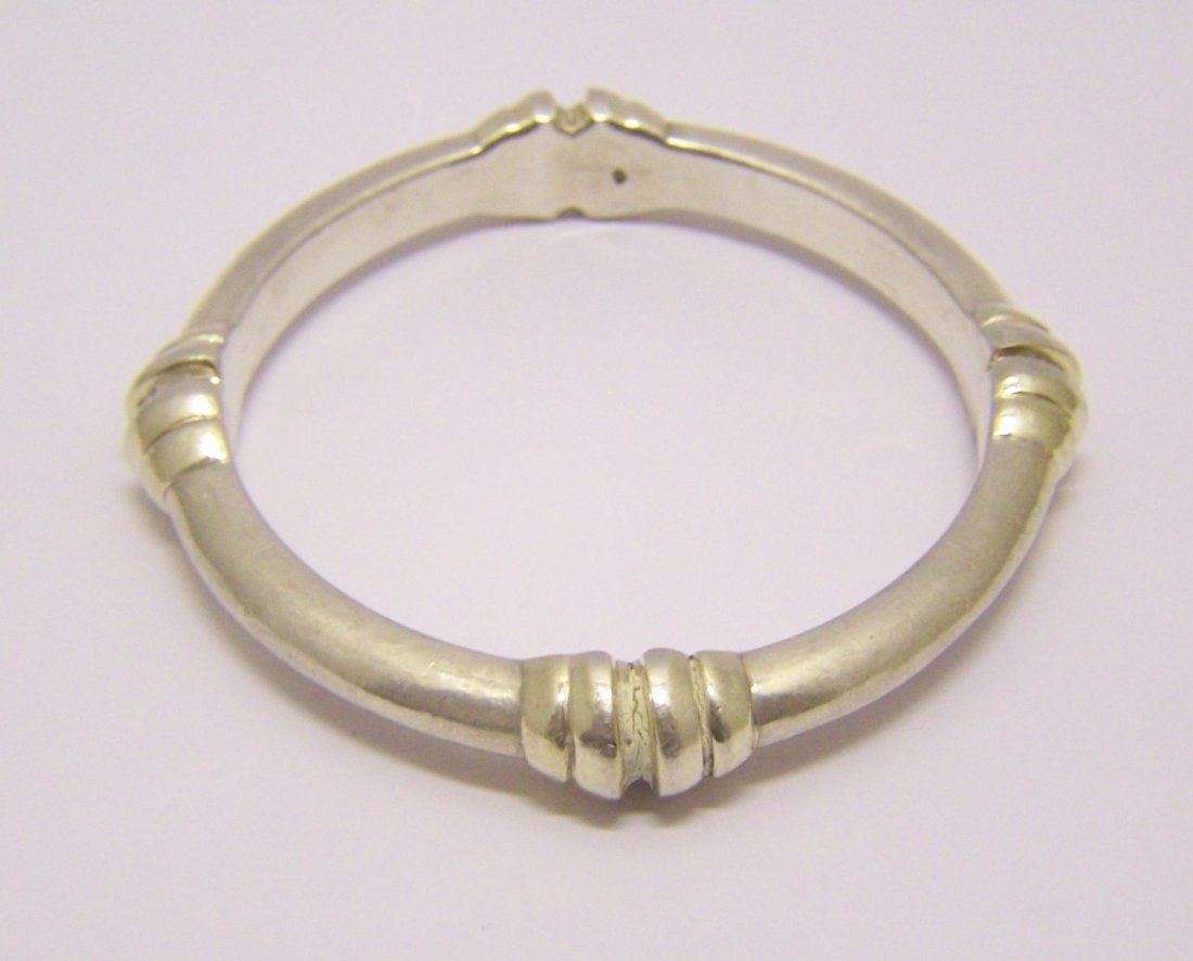 BRIAN sterling silver bangle bracelet: measures 8" in circunference by 1/2" wide, weights 22.4 grams, in good condition