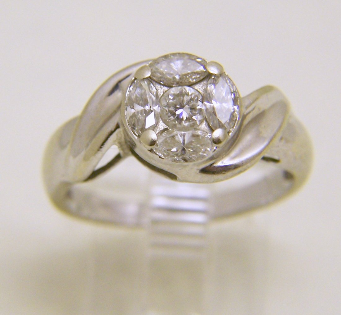 ADL 14k white gold 1 ctw diamond ring: top of the ring measures 3/8" wide, size 6 1/4, weights 3.7 grams,crafted with 4 marque & 1 round diamonds with a total weight of 1ct, G- SI2, in good condition