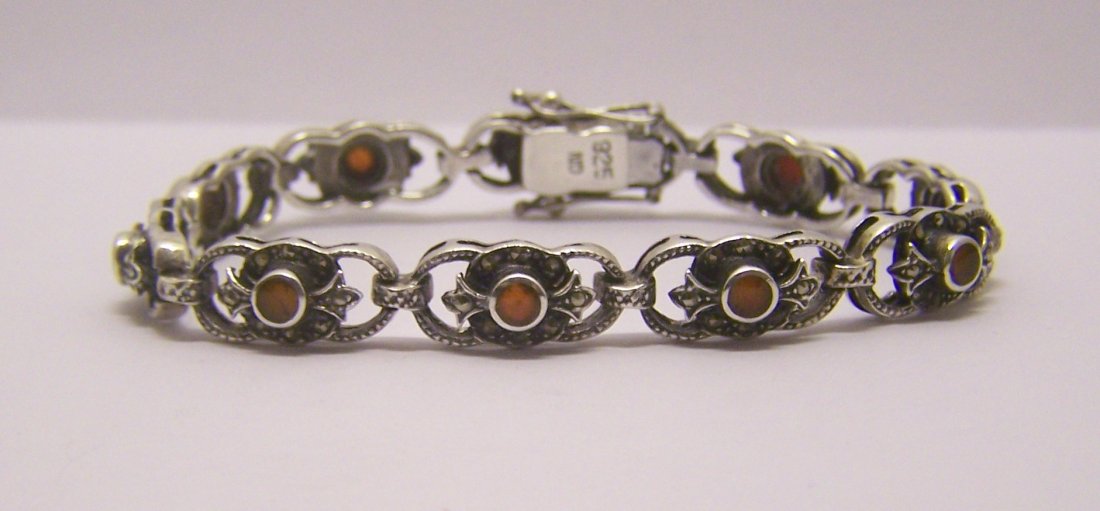 ND sterling silver carnelian bracelet: measures 7 3/8" long by 5/16" wide, weights 20.7 grams, in good condition