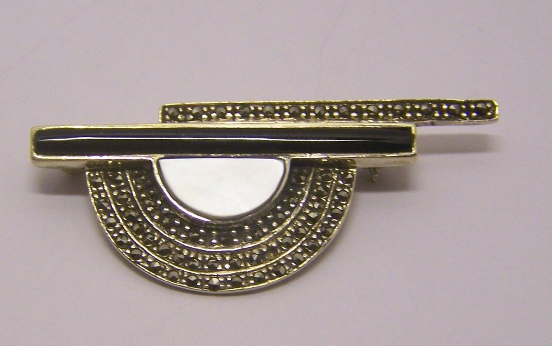 sterling silver mother pearl onyx marcasite brooch pin: measures 2 3/16" long by 15/16" wide, weights 10.4 grams, in good condition