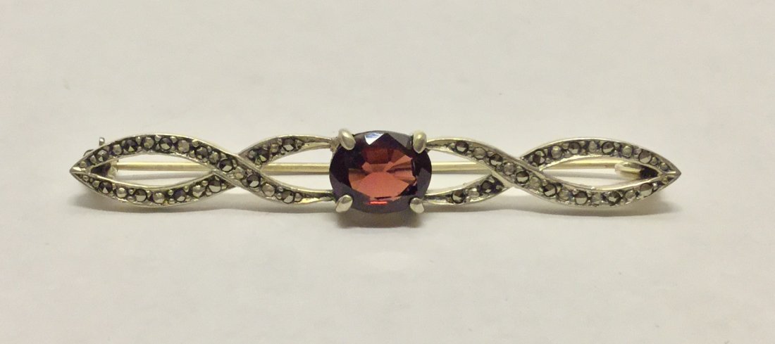 sterling silver marcasite garnet brooch pin: measures 2 3/8" long by 5/16" wide, in good condition