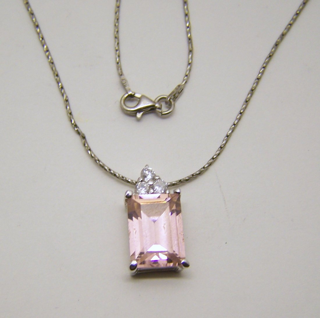 WS EVA sterling silver Cz pendant necklace: chain measures 16" long, pendant measures 13/16" long, weights 6.3 grams, in good condition