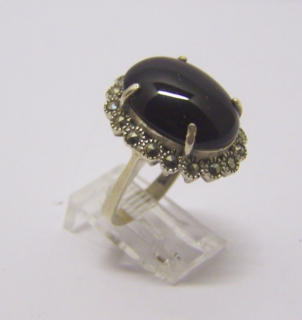 vintage sterling silver marcasite onyx ring: top of the ring measures 15/16" wide, size 8 1/2, weights 7.6 grams, in good condition