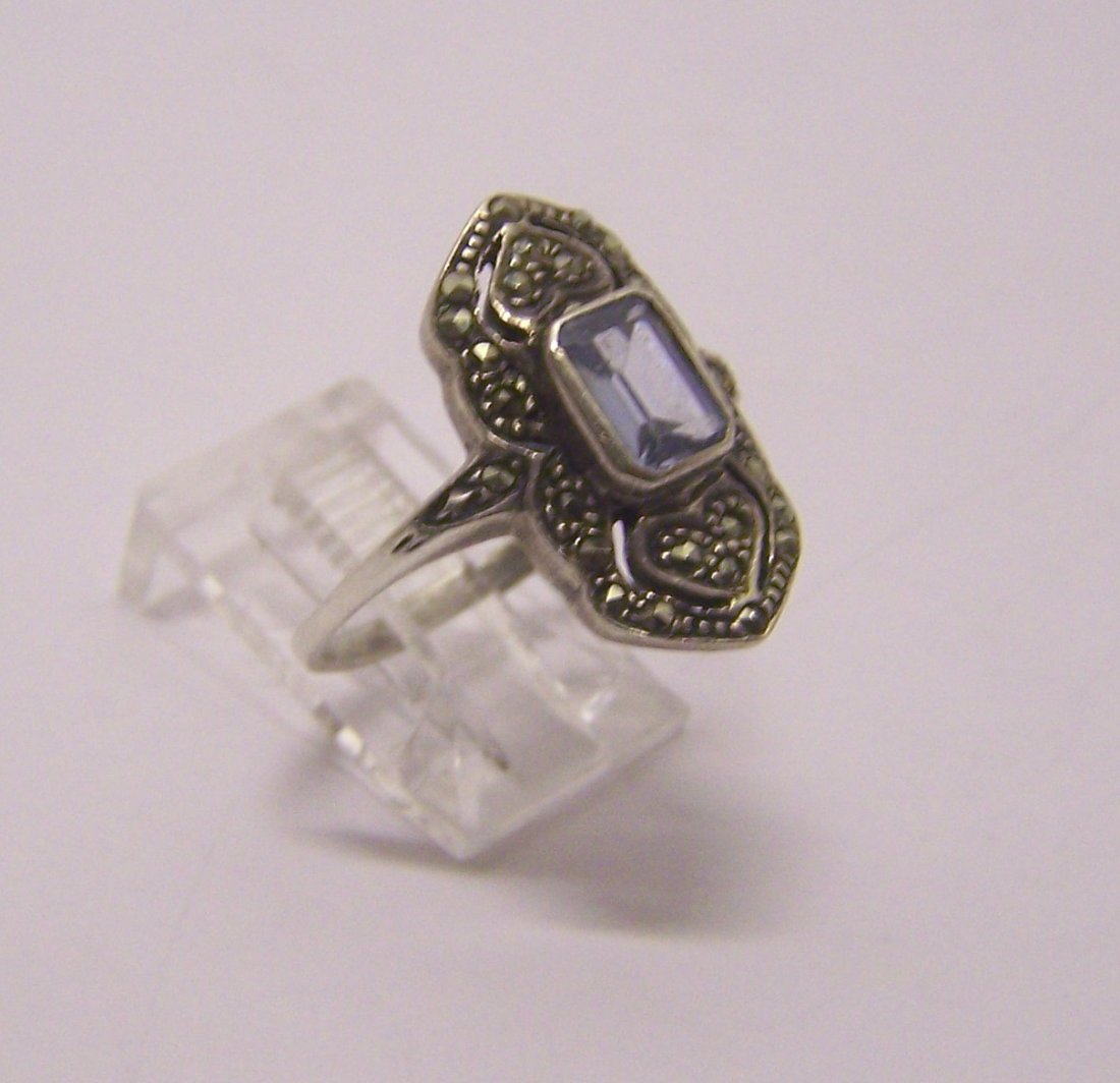 sterling silver topaz marcasite ring: top of the ring measures 13/16" wide, size 9 3/4, weights 4.3 grams, in good condition