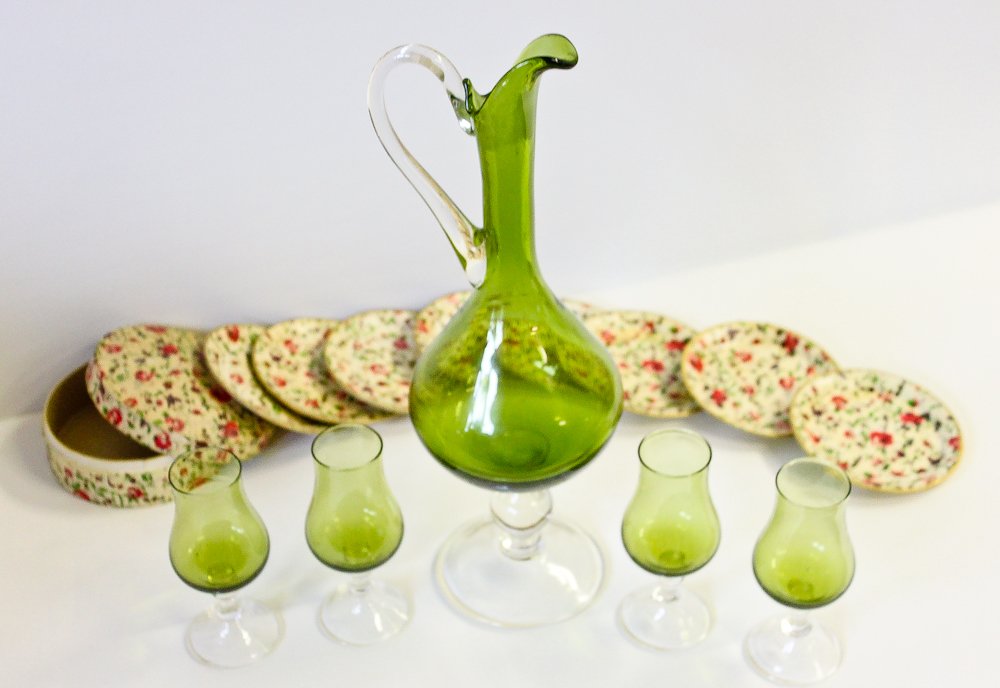 Antique Green Glass Decanter with matching shot glasses: Antique Green Glass Decanter with matching shot glasses &Â floral teaÂ saucers