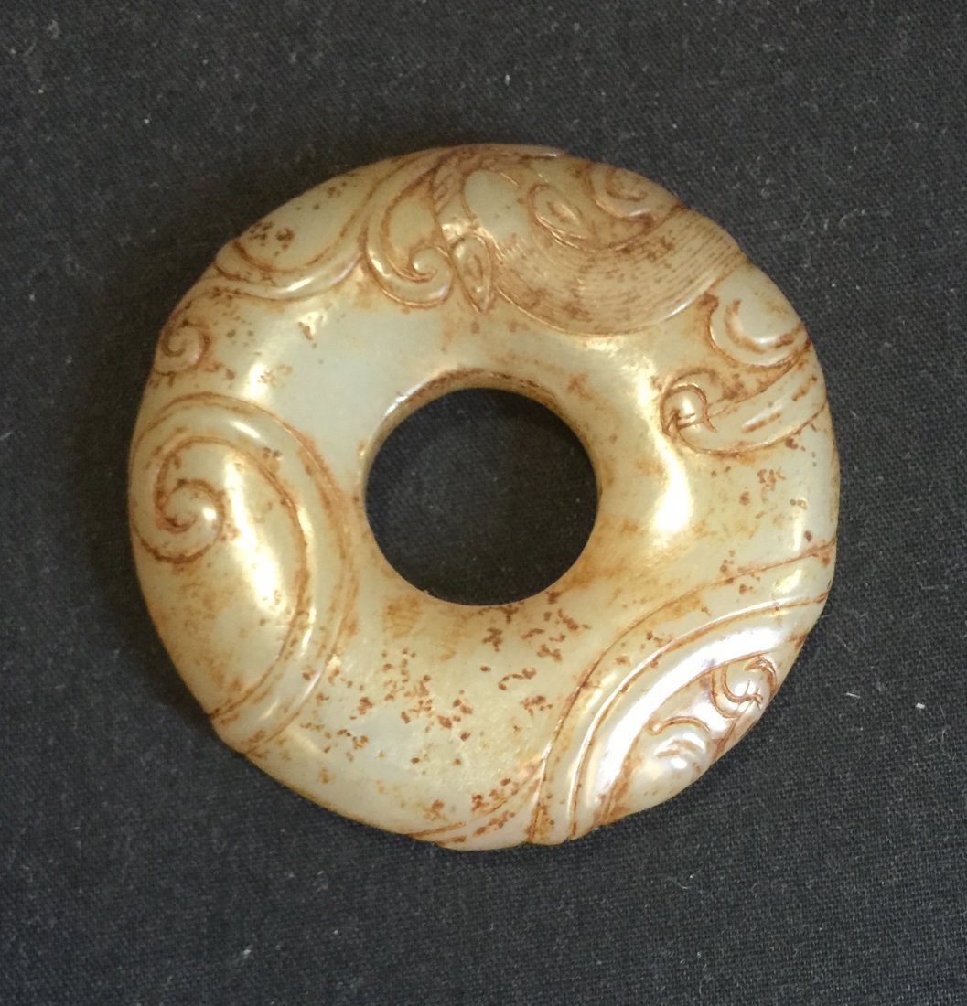 Archaic jade pendant. Han/Warring States. (1 of 2)