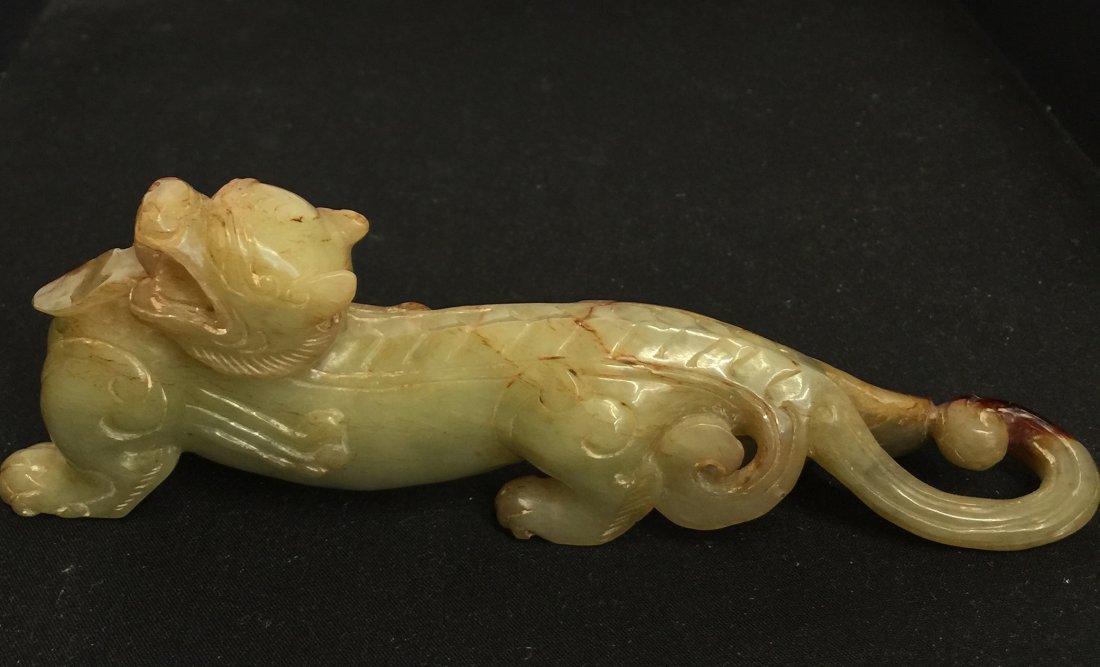 Archaic yellow jade dragon. Han/Warring States. (1 of 8)