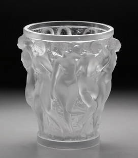 Lalique Bacchantes Crystal Vase: Hand etched mark along circular rim at foot: Lalique @ France. Catalog #997 originally created 22 July 1927. Condition: Good Height: 9 5/8 inches. Weight: 13 3/4 lbs. Condition: Good but with a few ni