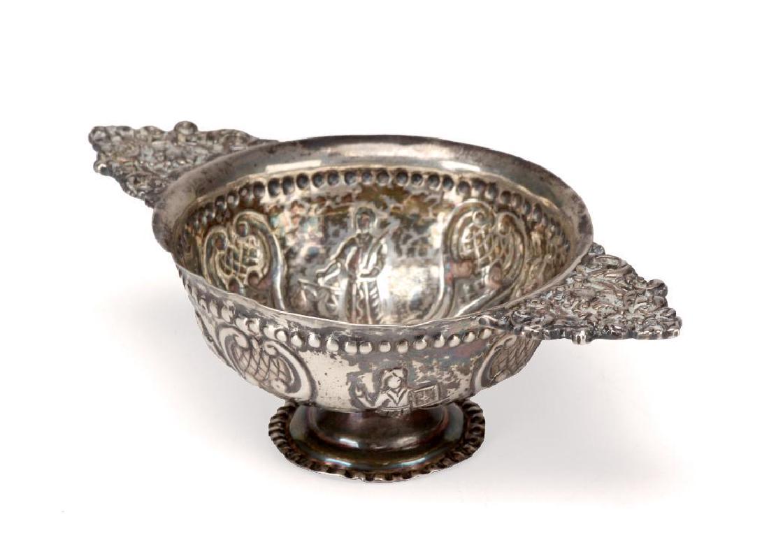 Dutch 18th C. Sterling Wedding Cup: Hallmark on base: 930, rearing lion with key. Actual weight: 2.09 roy ounces. Height: 1 1/2; Width: 5 3/8 inches.