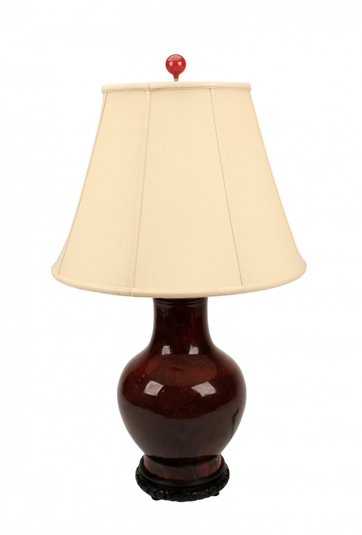 Chinese 19th C. Sang de Beuf Vase as a Lamp: Vase size: Height: 19 3/8., Overall: height: 35 1/2 inches. Condition: Drilled as lamp. Restored area around foot. Weight: 16 1/4 inches. 