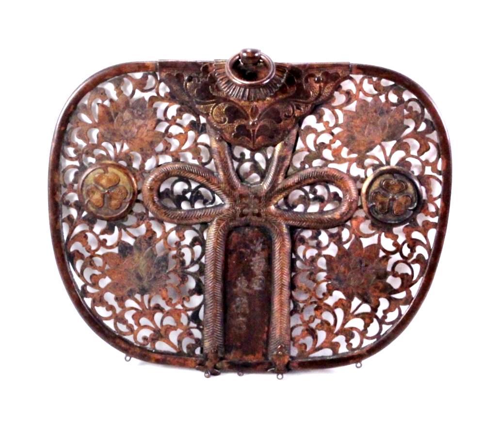 Early Edo Period Gilt Copper Keman: A bronze keman, decorated with lotus blossoms and the Tokugawa mon. Much of the gilding has been worn away over time. Length: 8 3/4 inches. Height: 8 1/4 inches. Weight: 1 lb.