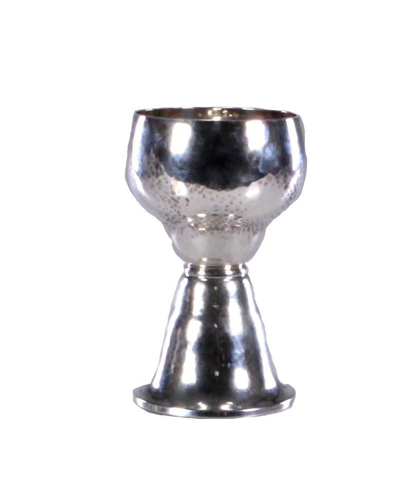 Lazarus Posen Sterling Silver Kiddush Chalice: A hand-hammered sterling silver chalice produced by Lazarus Posen, circa 1920. Lazarus Posen Witwe (Lazarus Posen's widow) was founded in Frankfurt on the Main in 1869 by Brendina Wetzlar, widow of si