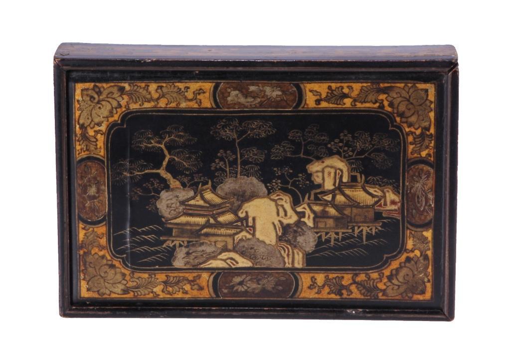 Japanese Edo Period Lacquer Box: The rectangular form wooden box with slide lid decorated with coastal village scene in a cartouche. Maki-e lacquer interior Dimensions: 1 1/4 x 7 3/4 x 5 1/4 inches. Weight: 1/2 lb. Condition: Some we