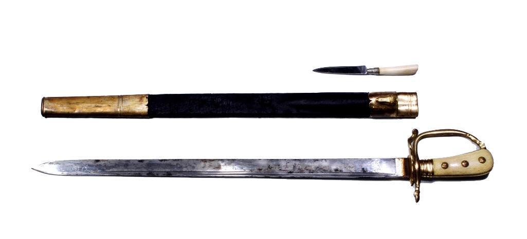 German Bavarian Forrestry Cutlass with Skinner: Solinger blade with leather sheath, handle in bone with royal crest on hilt. Skinner utility knife. Blade length: 23 1/4 inches. Overall length: 29 1/2 inches. Weight: 2 1/2 lbs. Not the original skin