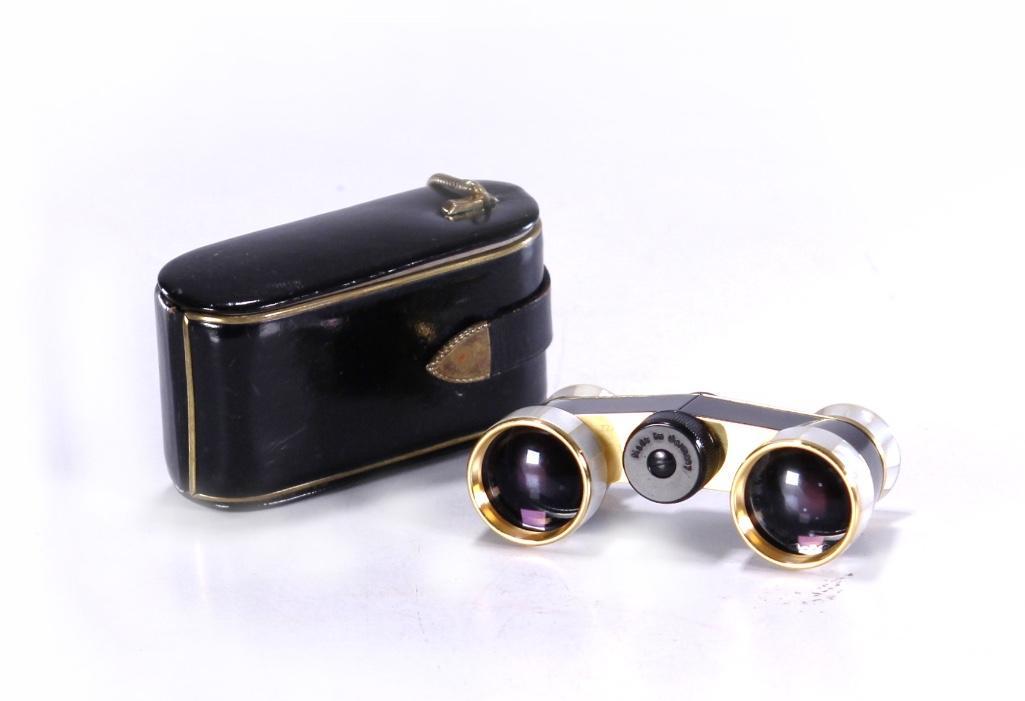 Carl Zeiss Diadem Brass Mounted Mother of Pearl Opera: Brass and mother of pearl Carl Zeiss Diadem opera glasses in a fitted leather case. Case: Length: 4 1/2; Width: 2 1/2; Depth: 1 3/4 inches. Glasses: Length (Fully Extended): 4 1/4; Depth: 2 inches. We