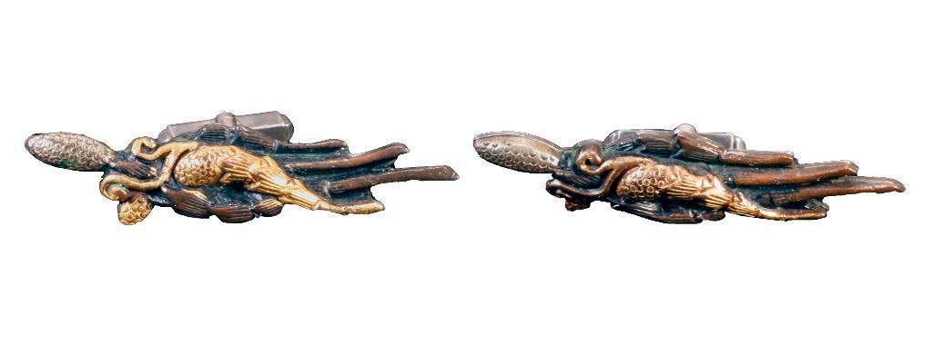 Pair of Japanese Meiji Period Menuki Cuff Links: Marked 'Silver' on reverse. Millet with silver and gold wash. Length: 2 1/4 inches. Weight: 21.6 g. / .69 oz.