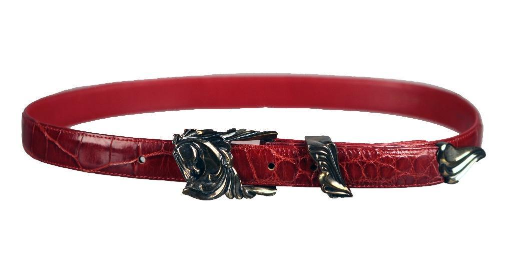 Ladies Rick Cameron Sterling Designer Belt: Marked on the back: Cameron Sterling, Back of belt Cameron Genuine Leather. Size: 36 inches. Weight: 1/2 lb.