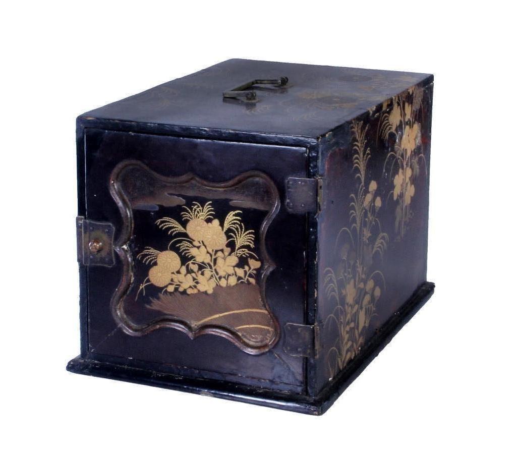 Japanese Meiji Period Lacquer Kodansu: Japanese lacquer kodansu with three drawers. Decorated in floral and butterfly motifs. Height: 8 1/4 inches. Width: 8 inches. Depth: 12 3/4 inches. Weight: 3 1/2 lbs. Condition: Some damage to lacquer